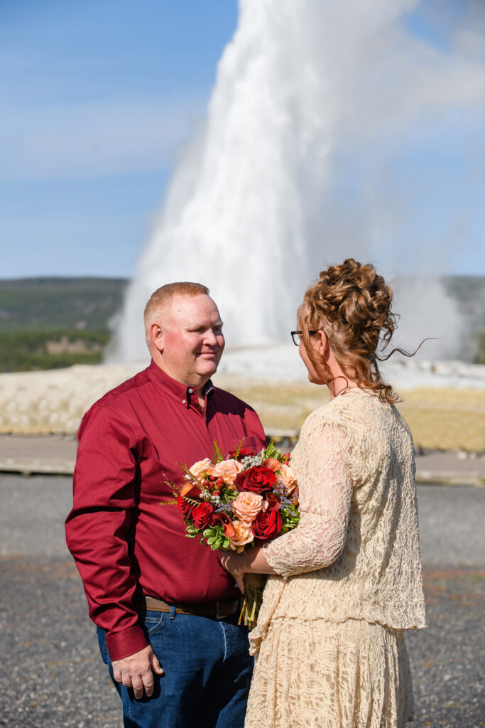 We married in front of an erupting Old Faithful in Yellowstone National Park October 5, 2021.