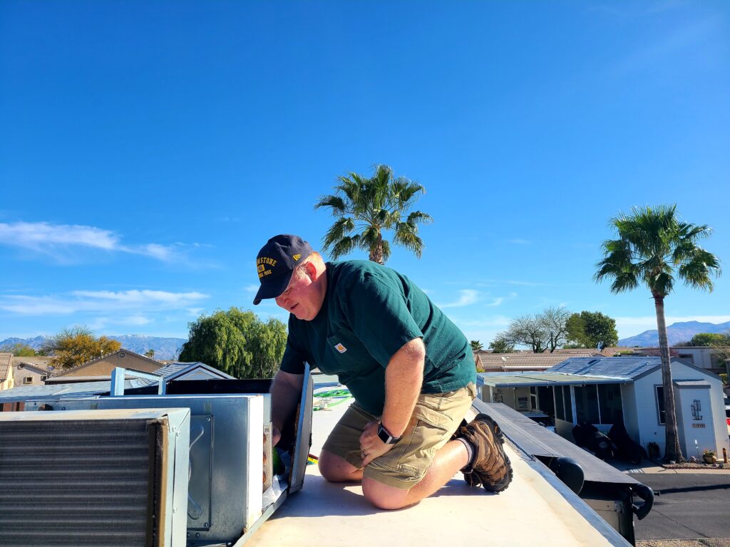 Rob Servicing the A/C on our motorhome.