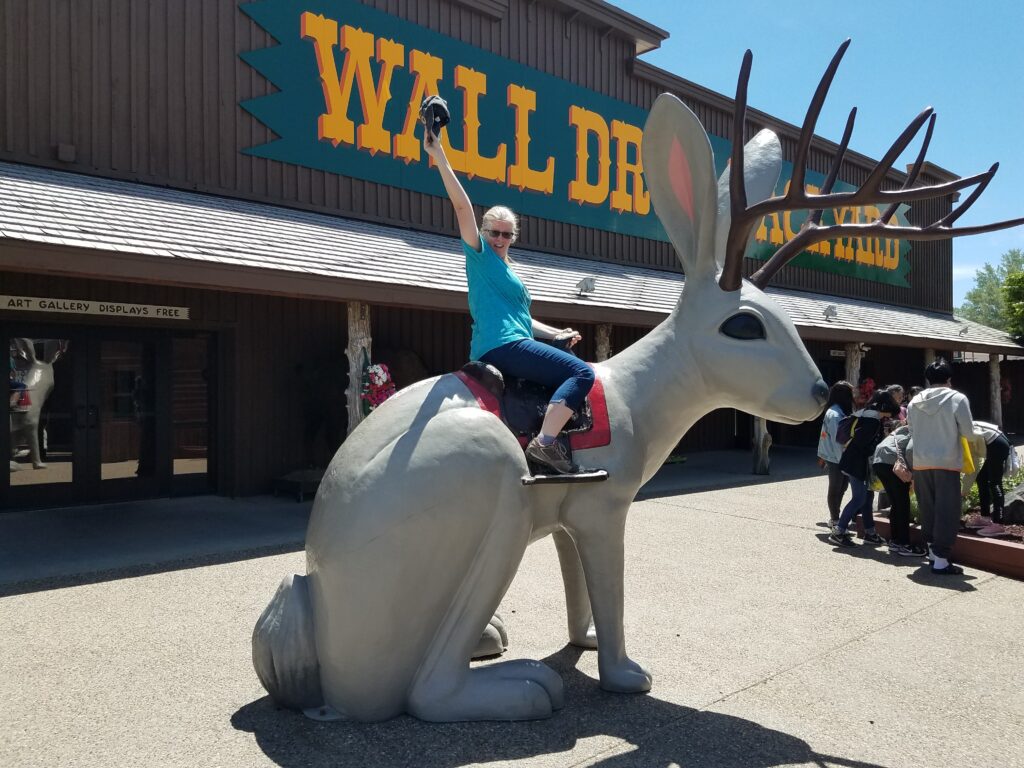 Lisa riding the Jackalope at Wall Drug