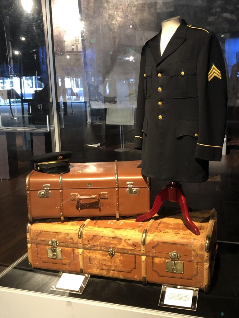 Display case of Elvis Presley stage costumes and gold records at Graceland