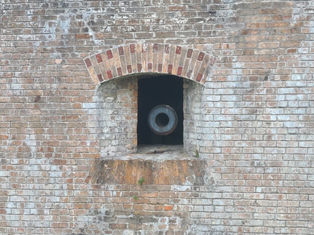 Historic cannon positioned atop Fort Pickens.