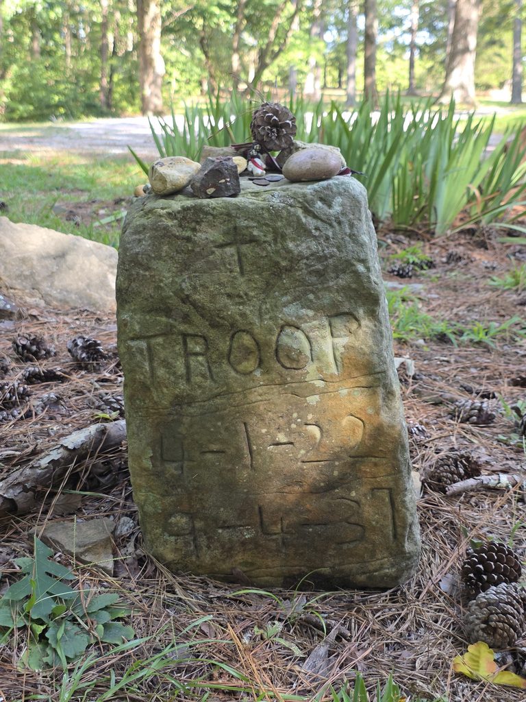 Troop's tombstone. Troop was the first Coon Dog buried in the cemetery.