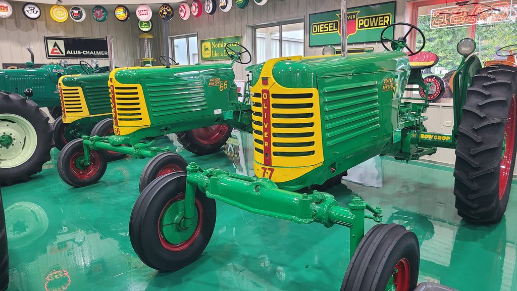 Restored antique tractors inside the Cammack Station collection