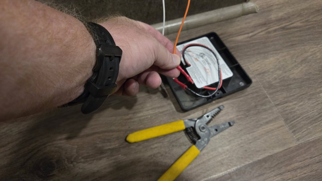 old RV propane detector removed from wall