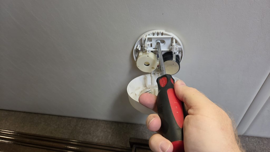 Removing original RV smoke detector mounting plate